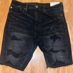 American Eagle distressed jean shorts. Color is like ash black. Waist size is 32